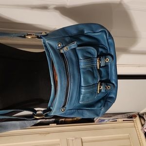 Tano for Anthropologie Wave Leather Crossbody in a teal like color